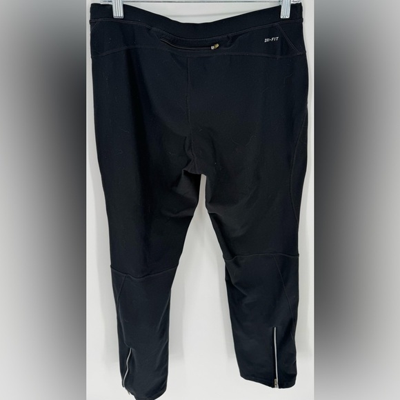 Nike Women's Dri-FIT Unlimited Zippered Cuff Versatile Pants - Picture 6 of 16